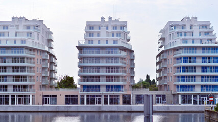 Modern European residential apartment buildings quarter. Abstract architecture, fragment of modern urban geometry.