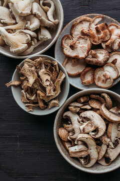 Different types of mushrooms in Bowls.