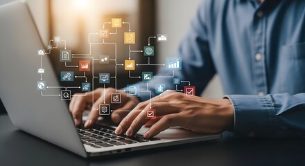 A person typing on a laptop with colorful flowchart icons coming out of it