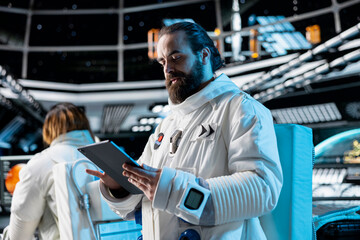 Cosmonaut tracking star and asteroids patterns, preparing for planetary mission outside. Astronaut looking at galaxy visualization, beginning landing procedures on solar system planet