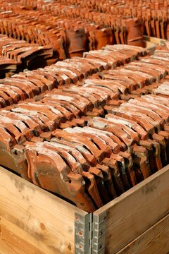 Weathered Terracotta Tiles in Wooden Crate
