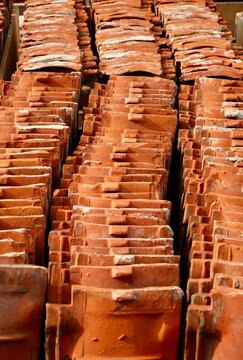 Stacked Clay Roof Tiles in Rows
