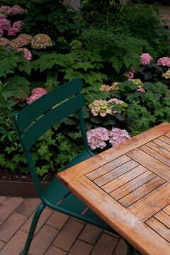 Wooden Garden Table and Green Chair