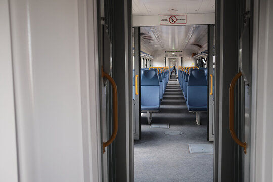 Train interior with empty seating during quiet hours