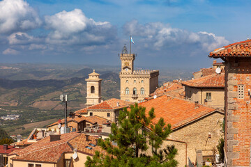 View of San Marino City rooftops with Palazzo Pubblico and surrounding landscape in San Marino