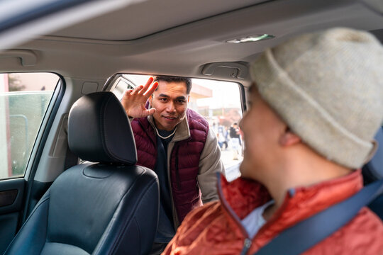passenger entering car