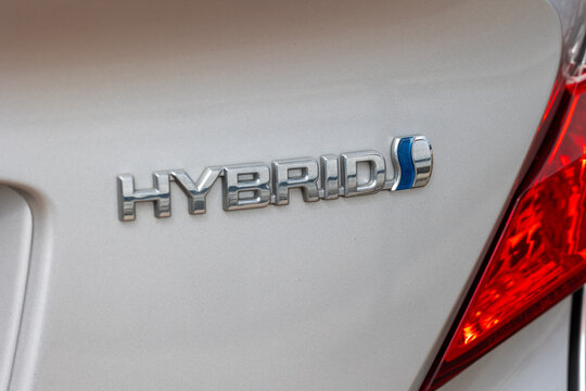 Hybrid car logo showing eco-friendly transportation