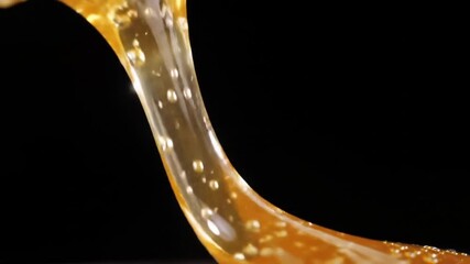 Abstract Viscous Liquid With Golden Hue And Subtle Bubbles - Powered by Adobe