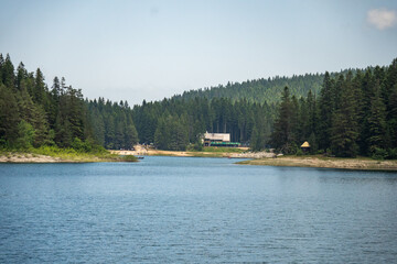 View of a restaurant on the shore across the lake in Durmitor National Park, in Zabljak, Montenegro