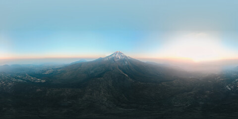 defaultPico de Orizaba at dawn with vibrant colors, highlighting the mountain&rsquo;s majestic landscape and its vital role in shaping surrounding watersheds and ecosystems.