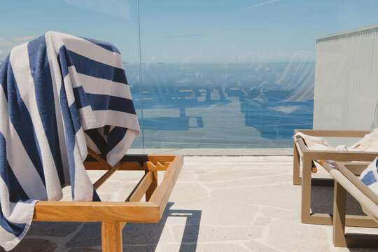 Rooftop Loungers with Ocean Reflection, Copacabana, Rio de Janeiro, Br