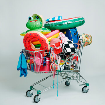 shopping cart full of different summer stuff