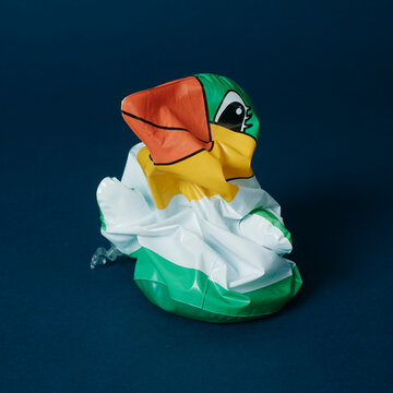 deflated penguin-shaped inflatable