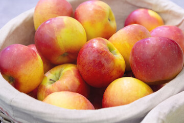 Red ripe apples on the counter market