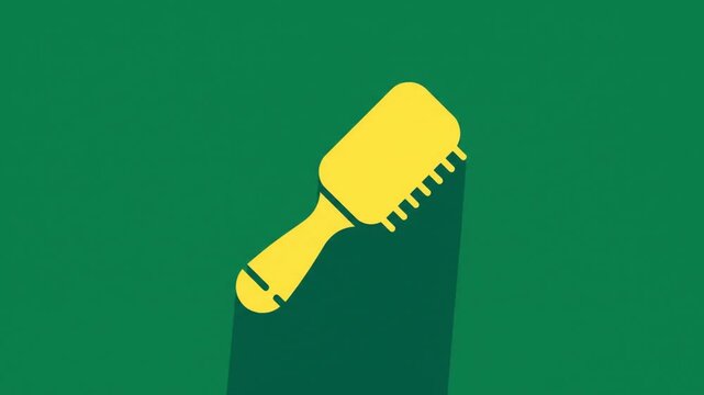Yellow hairbrush casting a green shadow