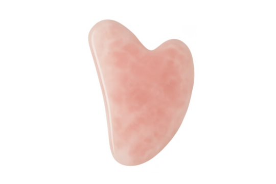 Heart-shaped pink gua sha stone for facial massage on transparent background