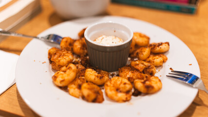 Golden fried garlic shrimp with aromatic herbs and creamy center sauce. Gourmet seafood dish perfect for restaurant menus, food blogs, and culinary photography