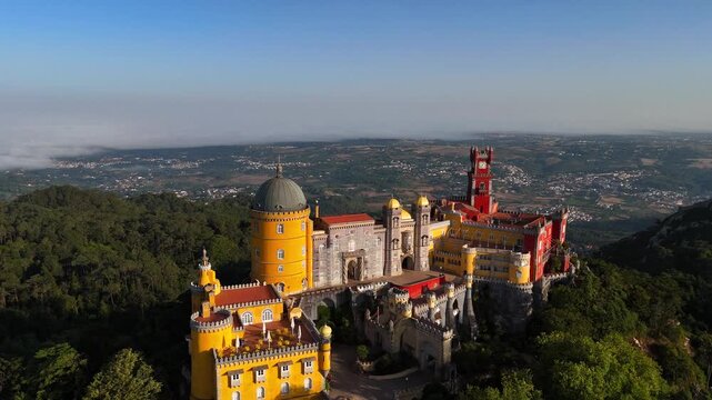 Pena Palace in Sintra, near Lisbon, Portugal, Europe.
Aerial shot of Sintra National Park and its fairytale villas.