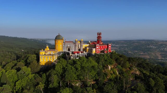 Pena Palace in Sintra, near Lisbon, Portugal, Europe.
Aerial shot of Sintra National Park and its fairytale villas.