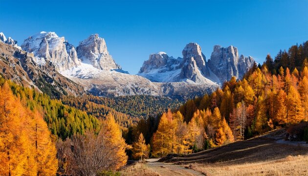 colorful forests and snowy peaks autumn on the croda da lago trail