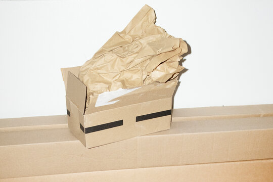 Brown cardboard package mail postal delivery boxes with flashlight