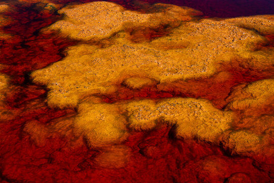 Colorful Mineral Deposits Beneath Acidic Water