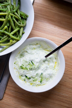 Tzatziki yogurt cucumber sauce in a white bowl
