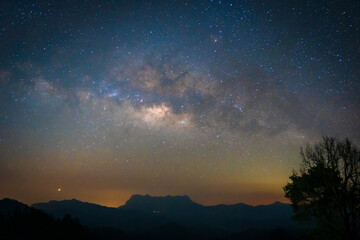 Fototapeta premium Beautiful landscape of Milky Way at Doi Luang Chiang Dao Mountain Peak viewpoint in the National Park at the Chiang Dao Camp site.