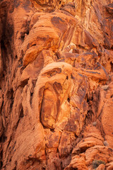 Dramatic red sandstone formations with face like the Scream or horror mask in Valley of Fire state park Nevada