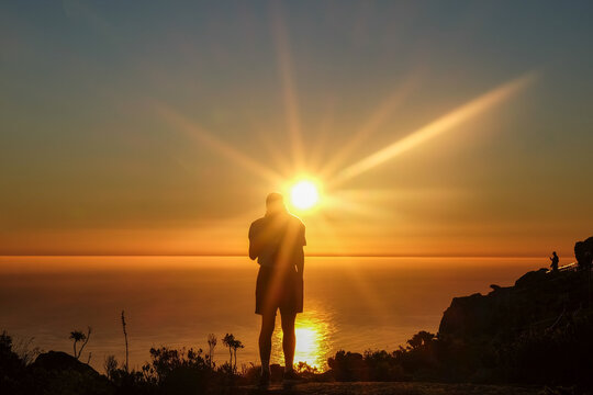 Sunset Starburst Behind Photographer