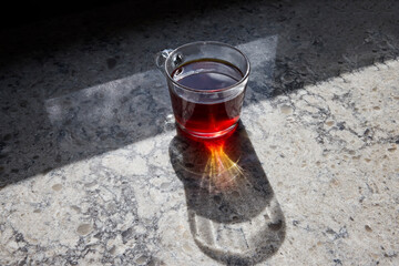 A cup of black tea on the table 