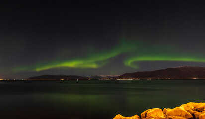 Aurora Borealis Northern Lights over Reykjavík Harbour, Iceland