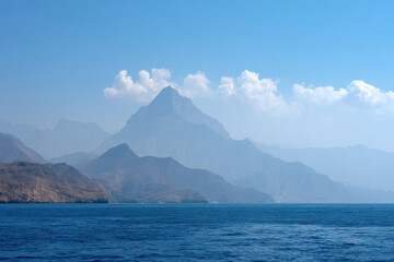 Fototapeta premium breathtaking view of top mountains in world contrasted with vastness of sea