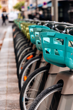 Colorful Parisian Rental Bicycles in Line