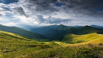Fototapeta premium dramatic mountain landscape with rolling hills and distant peaks under a cloudy sky in a tranquil setting