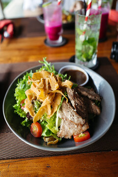 Delicious Salad With Grilled Meat and Fresh Greens