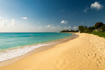 Beautiful golden sandy beach and azure ocean in Barbados