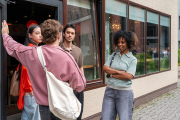 Friends Talking Outside Cafe