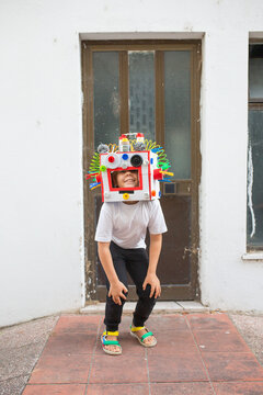 Boy dressed DIY robot mask 