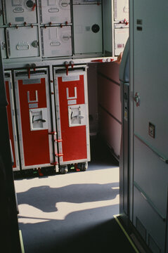 35mm film Airline Galley With Storage Units inside an airplane