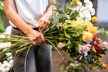 Florist Arranging Colorful Bouquet in Flower Shop