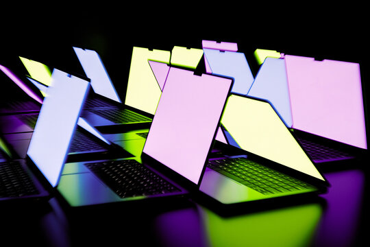 Digital Network - Glowing Laptop Screens