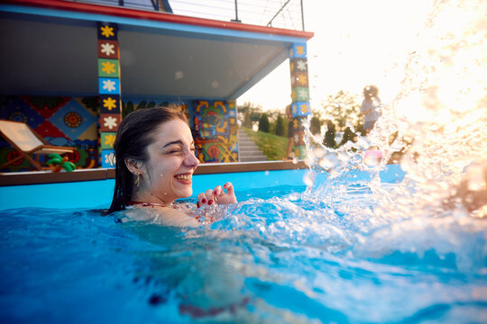 Woman enjoys her time in the pool