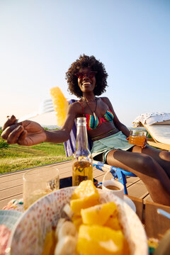 Happy woman enjoys summer time outdoors
