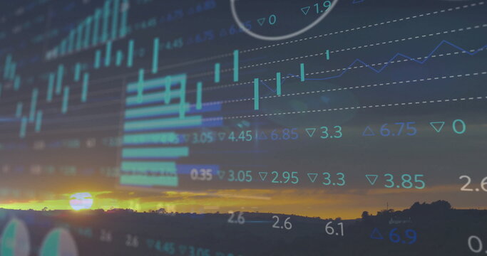Fototapeta Flowing translucent bar charts, line graphs across sunset hills showing stock values on grid lines