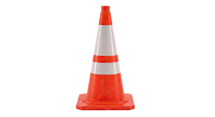 A single traffic cone with orange and white stripes isolated against a black background in a studio shot