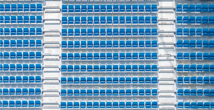 Organized Stadium Seating with Blue Chairs