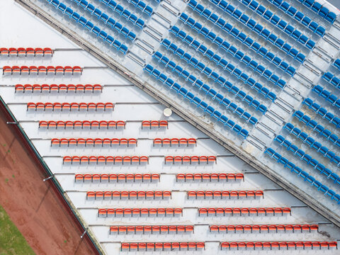 Aerial View of Diagonal Blue and Orange Stadium Seats