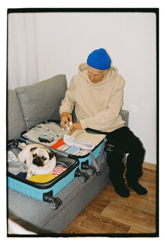 Preparing luggage for a trip at home