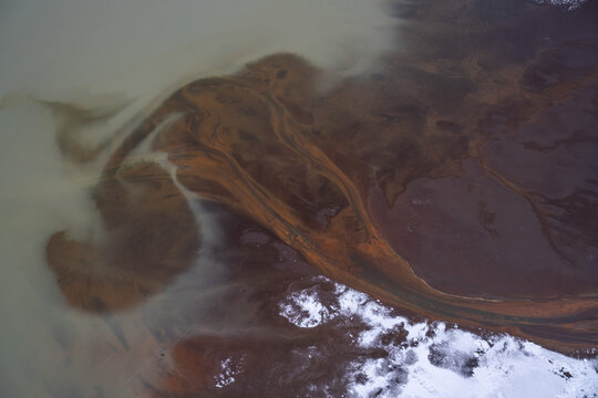 Glacial Rivers Flowing Through Volcanic Landscapes in Iceland